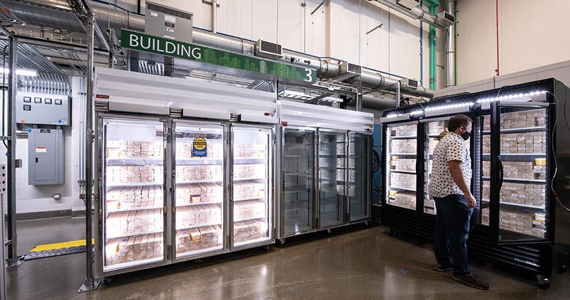 NREL Researcher Grant Wheeler, works in the Optical Characterization and Thermal Systems lab in the ESIF.