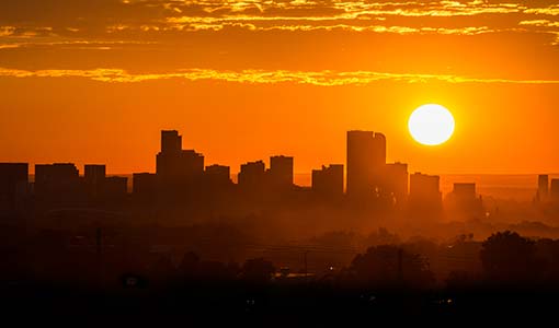 Sunrise over a city.