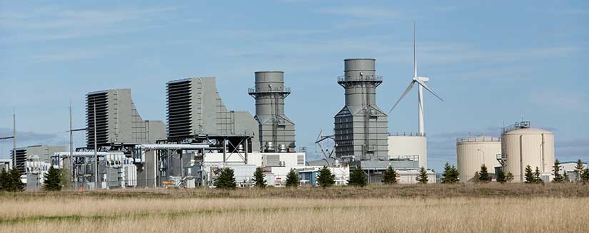 A natural gas plant collocated with a wind turbine