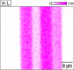 Scanning electron image of cross-section of a multijunction solar cell followed by EDS elemental maps of the indium in the cross-section.