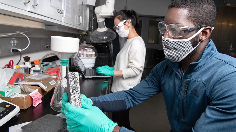 Photo of a researcher working in a lab