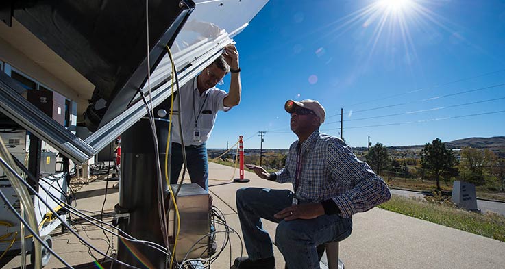 Two scientists working at the Outdoor Test Facility