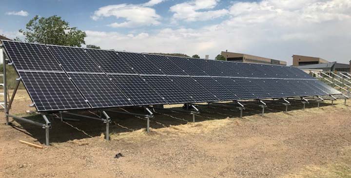 Photo of a row of solar panels installed at NREL.