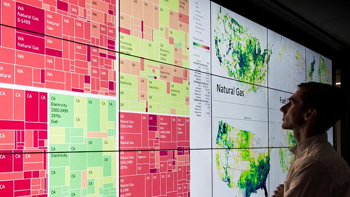 A man looking at a screen.