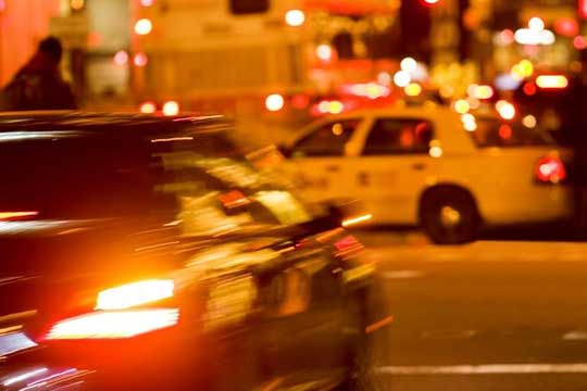 A busy intersection in urban setting.