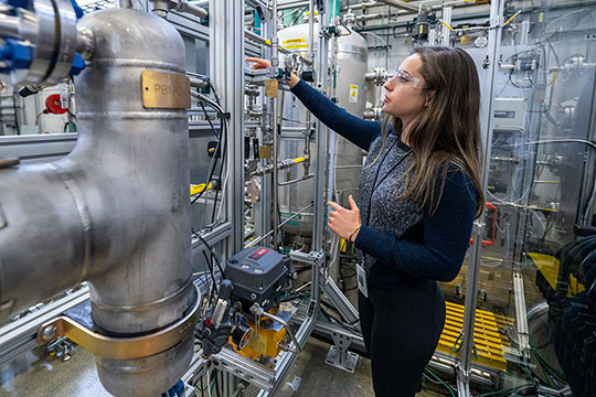 A woman working in a lab.