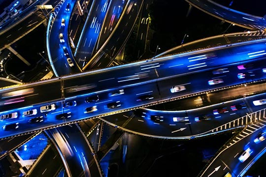 Photo of multilane highways in urban setting.