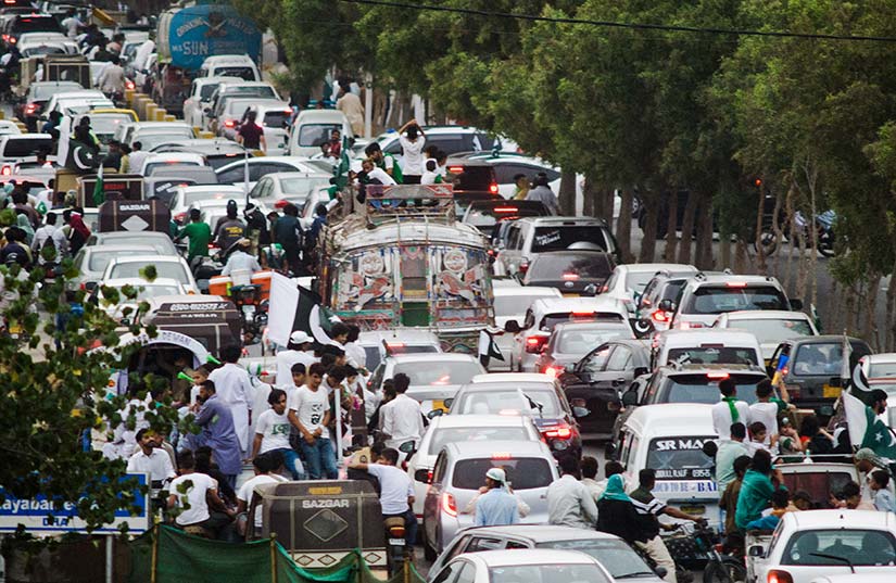 Photo of numerous vehicles stalled on a road.