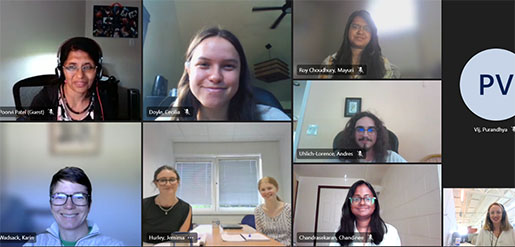 Zoom screen showing many people on a call.