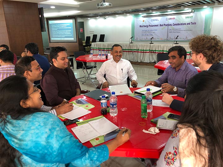 Photo of people sitting at a table.